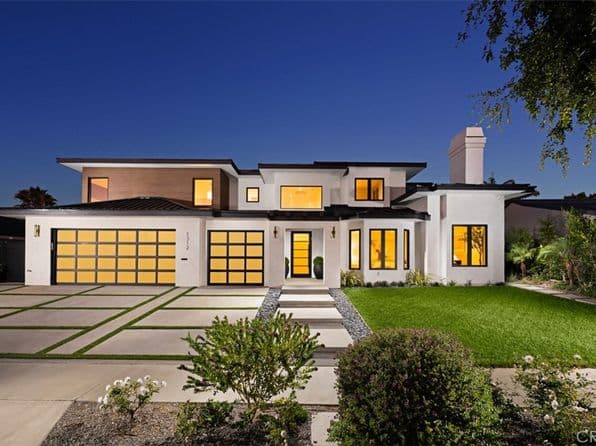 Luxury Orange County home illuminated at night
